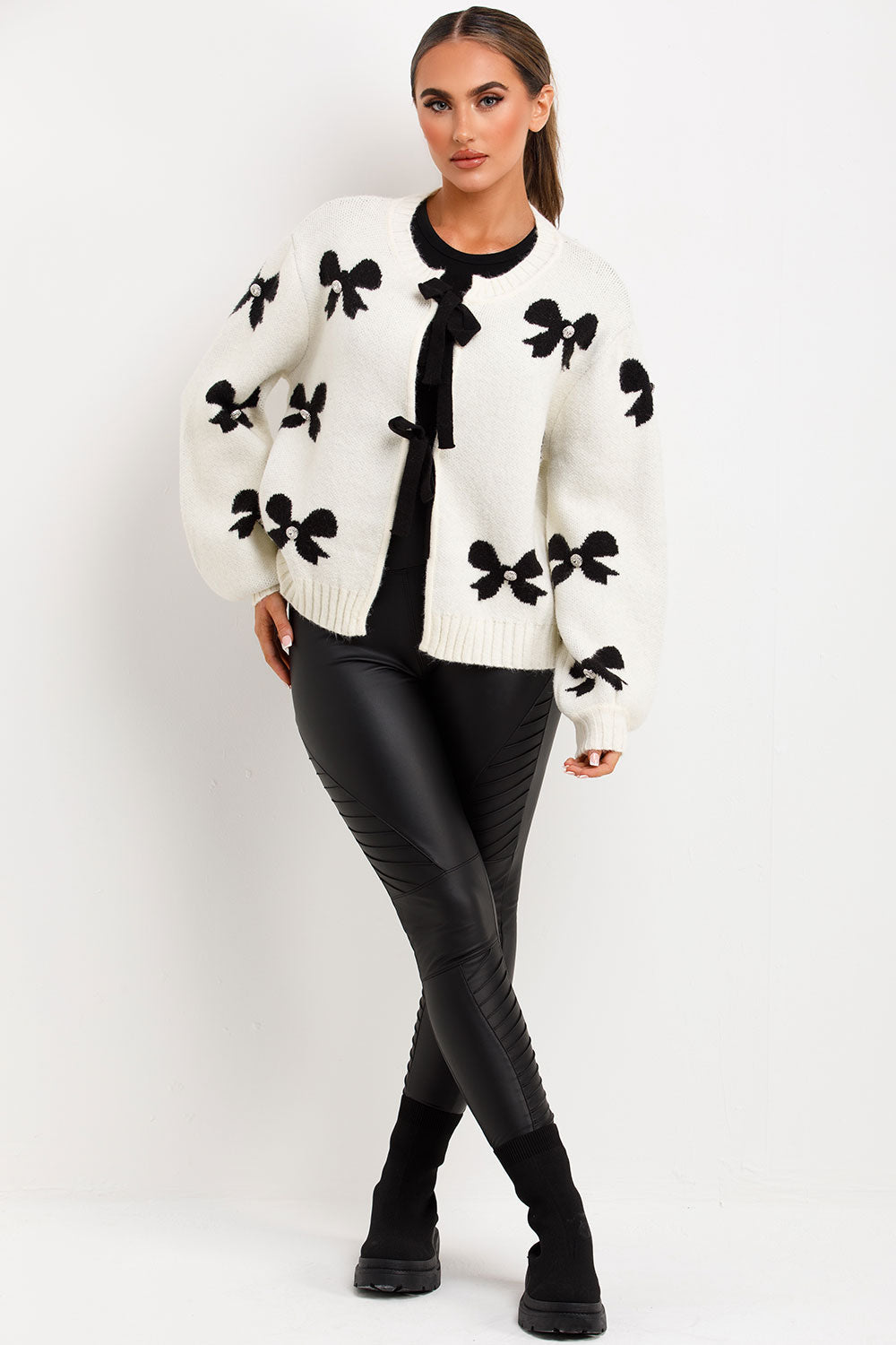 front-lace-up-knitted-cardigan-with-bows-and-diamente-buttons-in-white-styledup-fashion.jpg